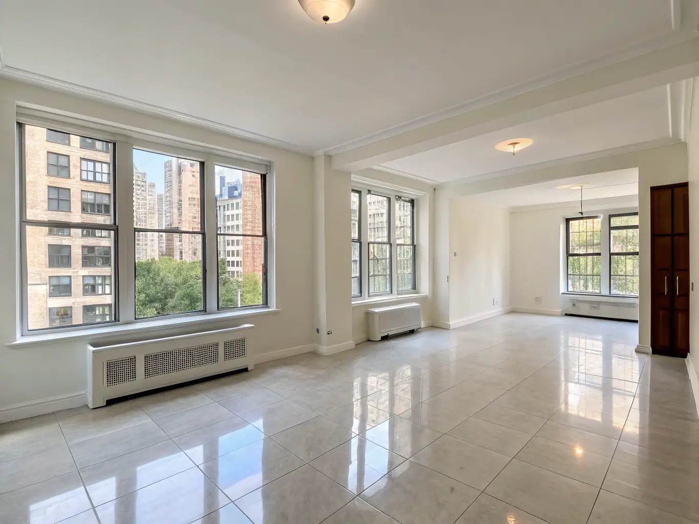 A vacant, spotless apartment after NeatZest Cleaning's end-of-tenancy cleaning service, with gleaming floors and clean windows, ready for new tenants to move in.